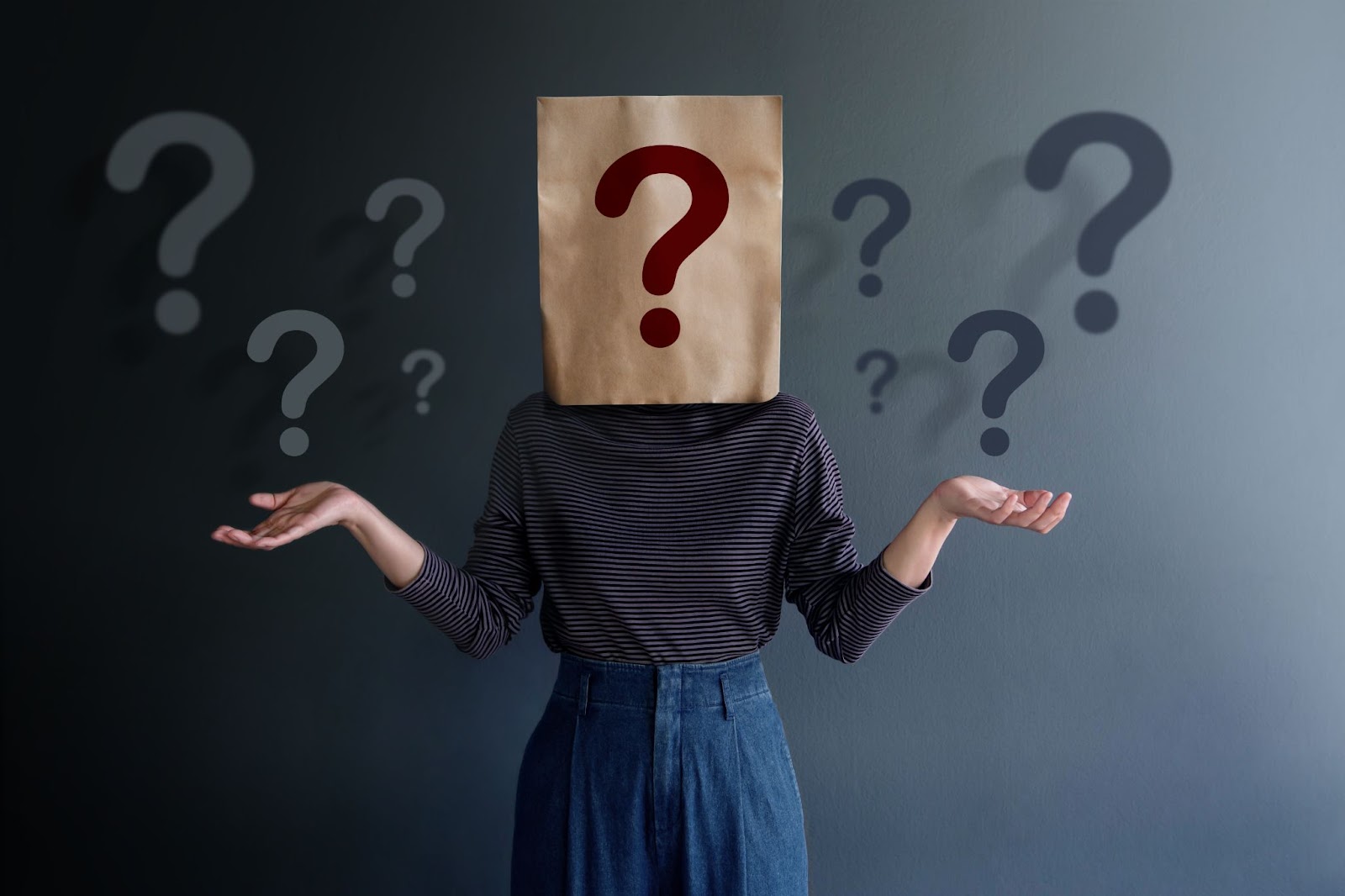 girl-paper-bag-thinking-why