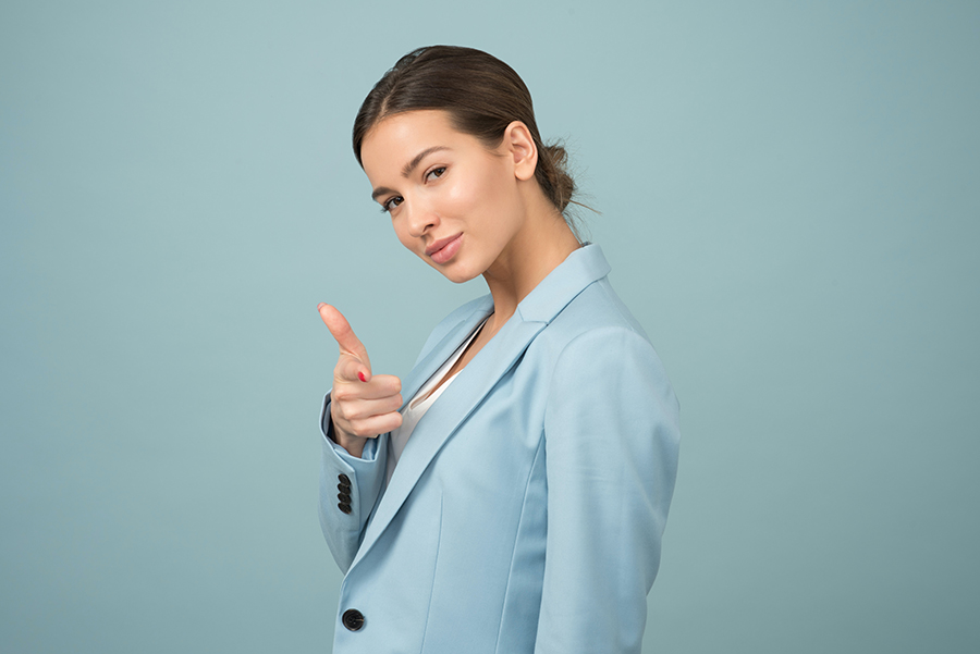 Lady in light blue washed pastel jacket