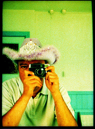 reflected self-portrait with Agfa Parat-I camera and pink cowboy hat by pho-Tony