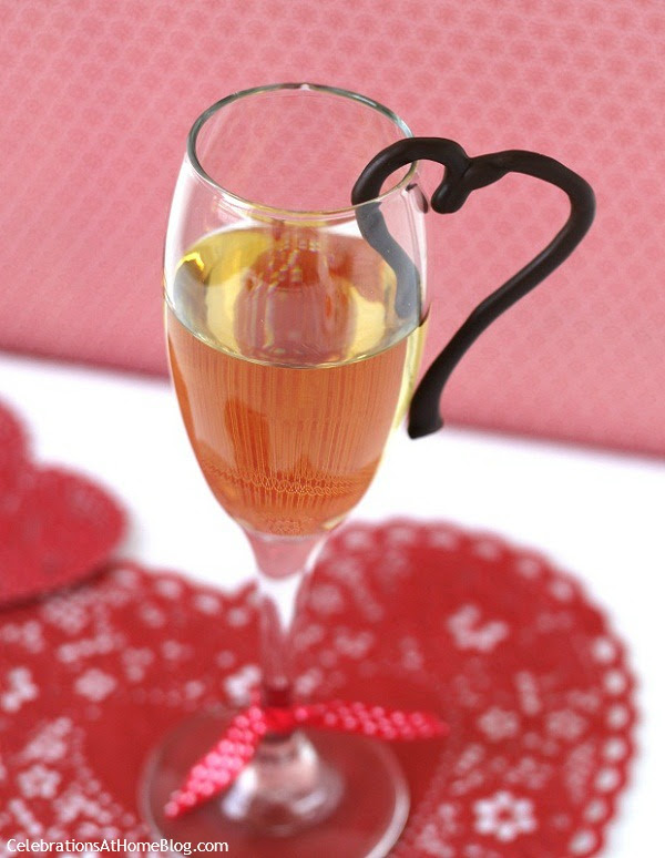 hang a chocolate heart on glass rim