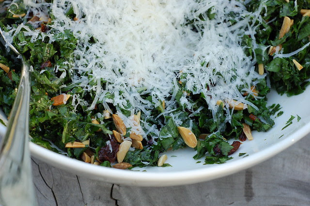 Massaged kale salad with homemade dried cherries, toasted almonds and Parmesan cheese by Eve Fox, the Garden of Eating blog, copyright 2013