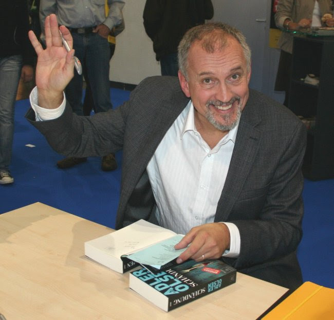 http://upload.wikimedia.org/wikipedia/commons/b/bb/Adler_Olsen_Buchmesse.jpg