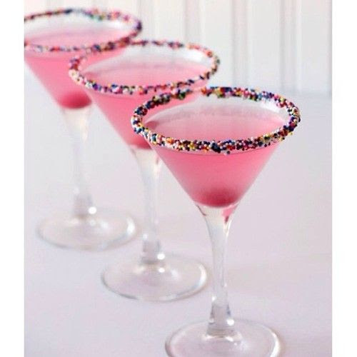 BIRTHDAY CAKE MARTINI 2 oz. (60ml) Vanilla Vodka 1 oz. (30ml) Cranberry Juice Top with Champagne Glass rimmed with Sprinkles Tipsy Bartender