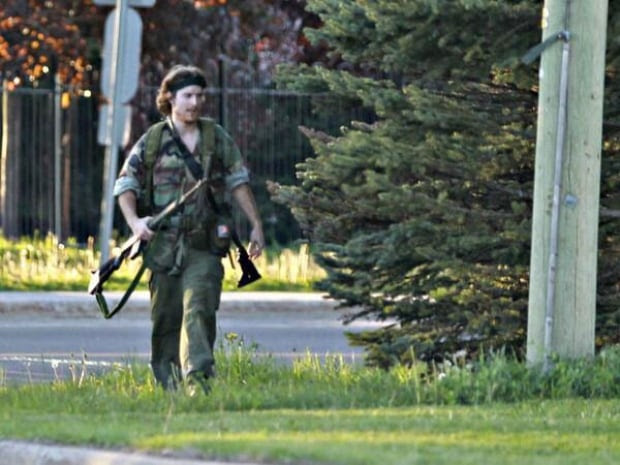 The RCMP identified the suspect of a massive manhunt as 24-year-old Justin Bourque. This image of Bourque was taken by Moncton Times and Transcript photojournalist Viktor Pivovarov.