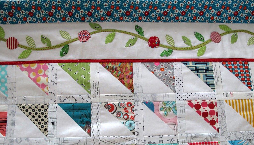 Finished one side of this border on the HST quilt