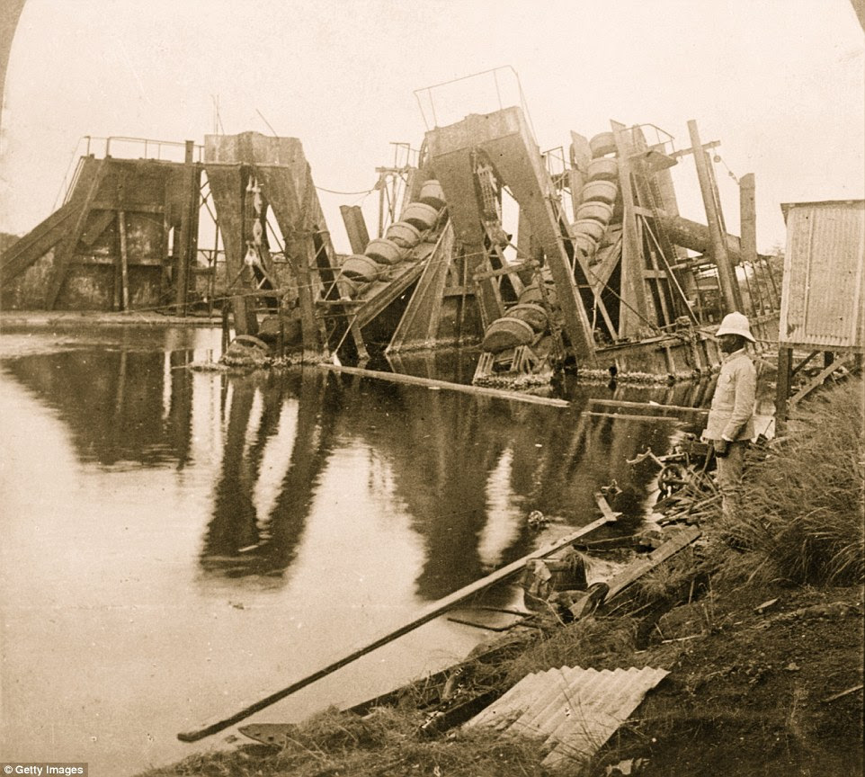 Abandoned French machinery on the bank of Panama Canal near Cristobal lies unused following the arrest of Ferdinand de Lesseps