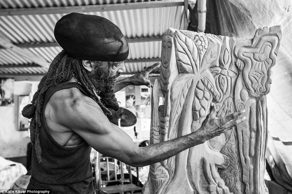 A local Dominican artist sculpts an intricate representation of the surrounding natural attractions