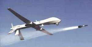 Armed Predator drone firing Hellfire missile