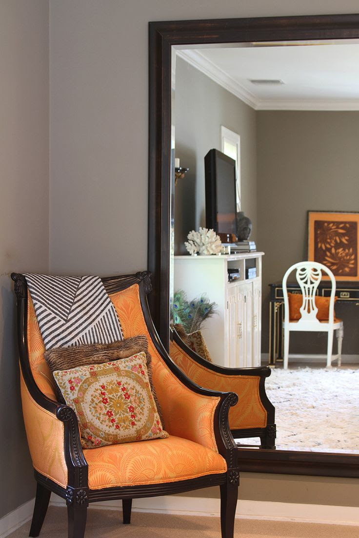 greige walls (Farrow & Ball Mouse's Back) plus orange accent plus light floors and white baseboard