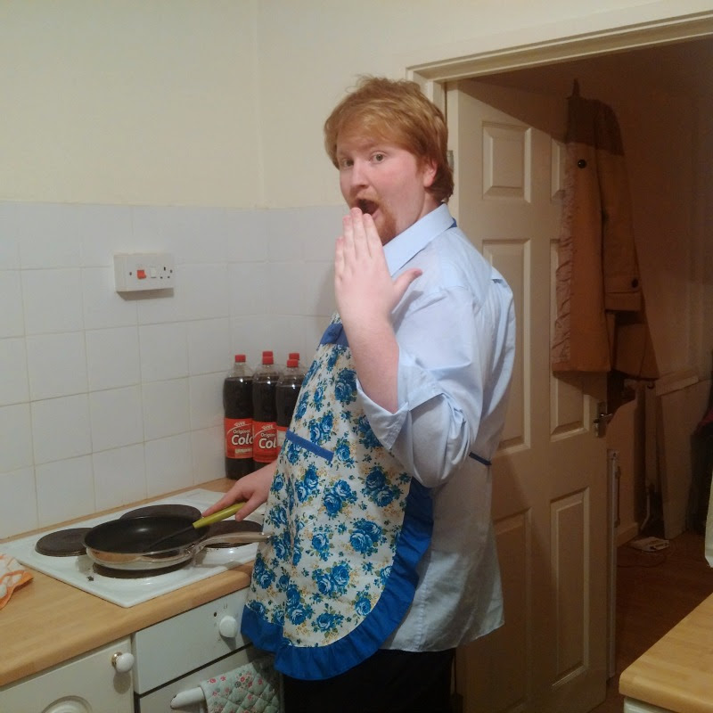 Anthony in a floral apron