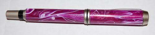 Pen with top