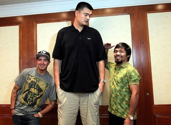 Manny Pacquiao and fellow boxer Brandon Rios pose with former NBA basketball player Yao Ming. Manny Pacquiao and fellow boxer Brandon Rios pose with former NBA basketball player Yao Ming.