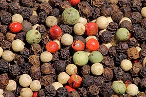 A mixture of black peppercorns from the Malaba...