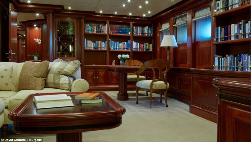 There are plenty of spots for guests to unwind across the vessel's three levels of living space. Wall-to-wall bookshelves can be found in the library area, above