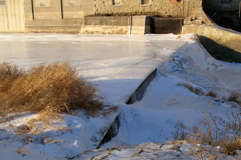 The Vermillion Falls in Hastings, Minnesota are frozen over with ice and snow.
