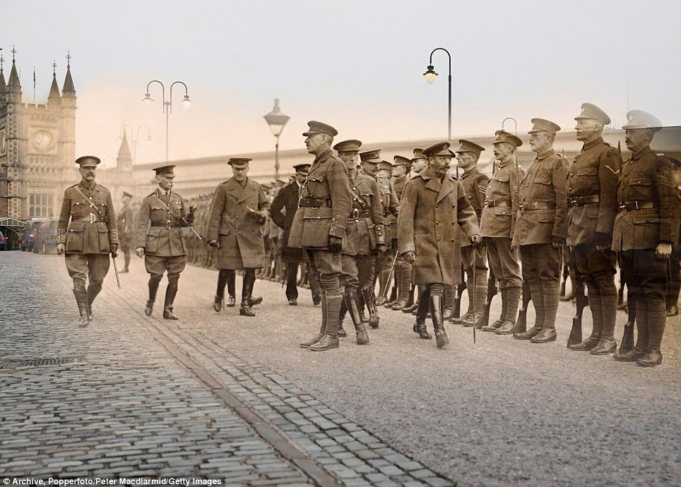 Attention: King George V inspects troops in Bristol circa 1915, and taxis are seen lining up at Bristol Temple Meads railway station earlier this month