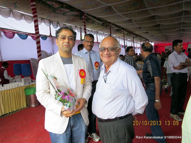 Mr. Sanjay Deshpande with Home Owners - Handing Over Ceremony of Sanjeevani Developers' Sangam at Sus on Sunday 20th October 2013