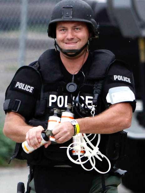 Police threw canisters of pepper spray and smoke at marchers- ap Police threw canisters of pepper spray and smoke at marchers- ap