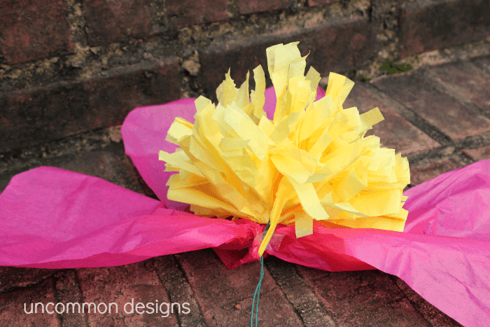Such a cool and easy craft... make giant tissue paper flowers! www.uncommondesignsonline.com #tissuepoms #partyplanning 