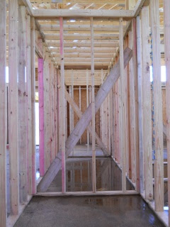 House Internal Walls Looking Down the Pantry and Closet from the Bathroom
