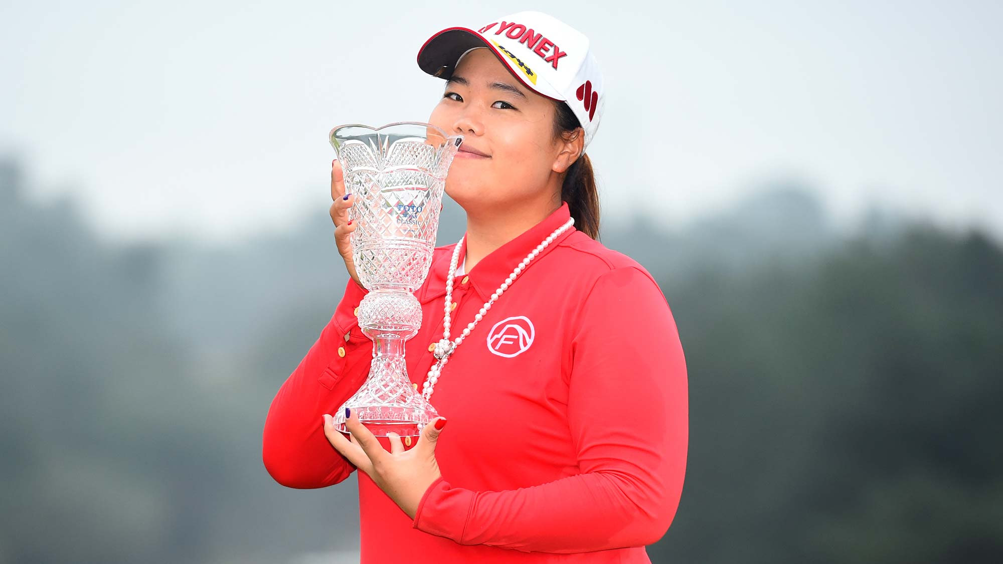 Sun-Ju Ahn holds TOTO Japan Classic trophy