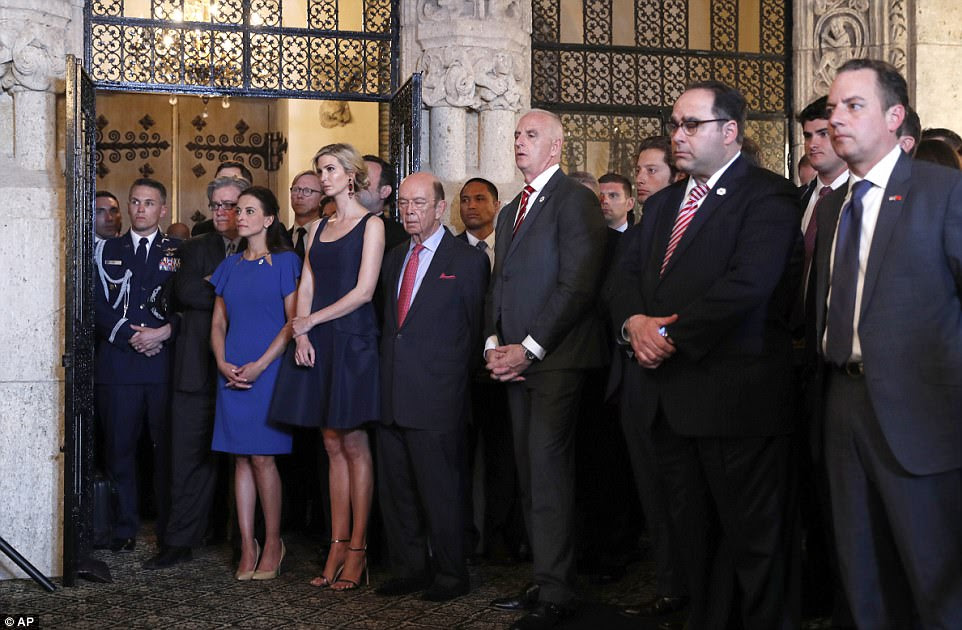 Ivanka Trump, the daughter and assistant to President Donald Trump, third from left, stands next to Commerce Secretary Wilbur Ross, as they listen to President Trump speak about the strikes at Mar-a-Lago. Right is White House Chief of Staff Reince Priebus. 