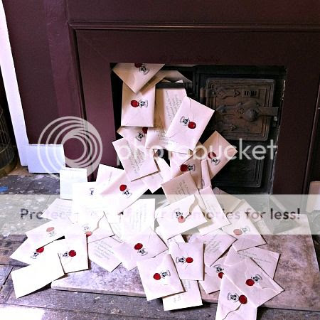 Mock-up of Harry's Hogwarts letters coming through the fireplace - The House of MinaLima