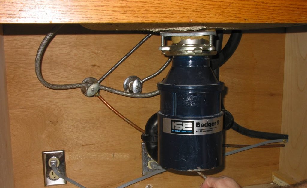 How To Remove Garbage Disposal Flywheel HOWTOREMVO