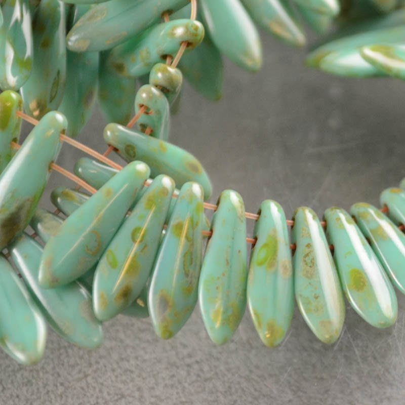 s43886 Glass Beads - Czechmates - 5 x 16 mm 2 Hole Dagger Beads - Light Turquoise Green Picasso (Strand 50)