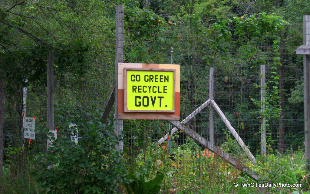 The sign reads 'go green recycle government' which is the current trend of the upcoming elections in November.