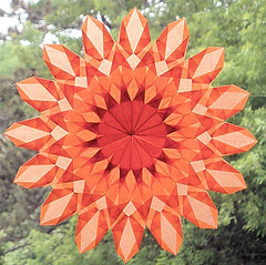 Orange Sunburst Star with 16 Points