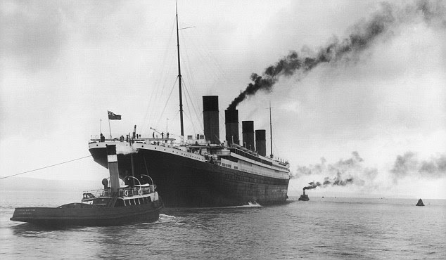 The White Star Liner RMS Titanic, built by Harland & Wolff in Belfast, 4th February 1912, aided by four tugs preparing to leave for Southampton for her maiden voyage to New York on April 10th 1912