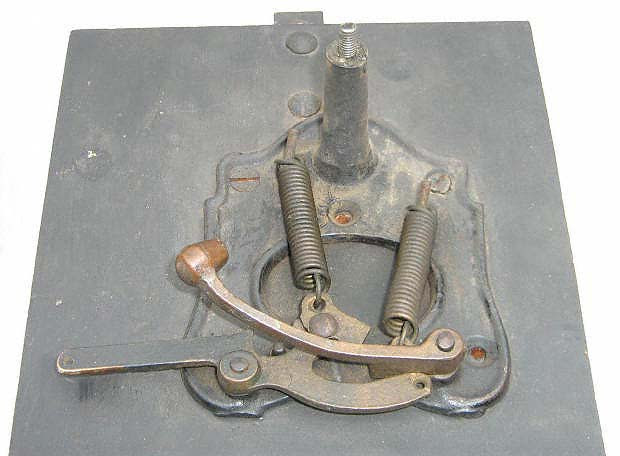 Bell trip mechanism.
