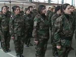 Mulheres entram em grupo paramilitar para lutar por Assad