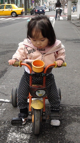 Miyu with her tricycle