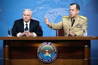 Defense Secretary Robert M. Gates and Navy Adm. Mike Mullen, chairman of the Joint Chiefs of Staff, address the media during a press conference at the Pentagon Wednesday.