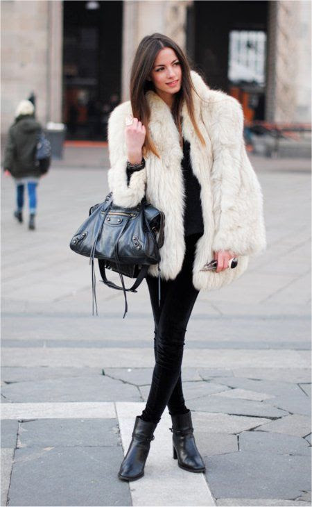 Hmmm. I actually have a white fur coat just like this...my grandmothers...maybe I will break it out!