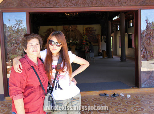 me and mom in front of temple