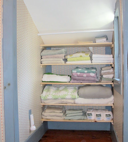 a new shelf awaiting a curtain