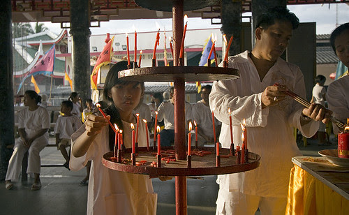 Lighting candles and incense
