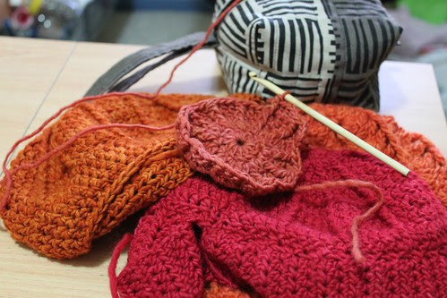 Crocheting the last of the hats