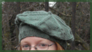 Knitted beret tam in seed stitch with flower shape