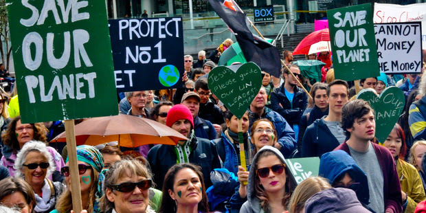 Hundreds took part in the People's Climate March in Auckland on Sunday. Photo / Gil Hanly