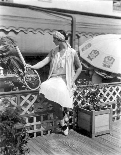 Woman models tennis fashions at Burdine's: Miami, Florida