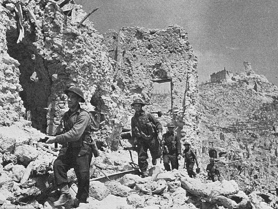 Men of the 2nd NZ Infantry Division advance into the town past the ruins of the Hotel Des Roses. Historian Angelos Mansolas has researched the Battle of Monte Cassino for his new book Monte Cassino, January - May 1944, The Legend of the Green Devils