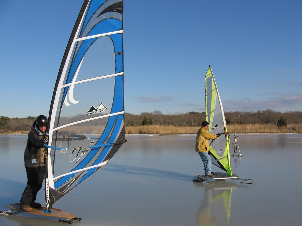 Jon backwinds to a stop while Scott brakes the Icesurfer