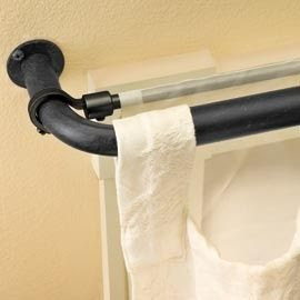 Use a bungee cord to instantly hang a second sheer curtain panel behind existing curtains instead of hanging a second pole.