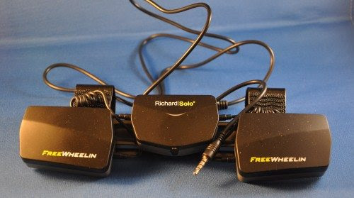 FreeWheelin attached to clip with round charging cable. FreeWheelin attached to clip with round charging cable.