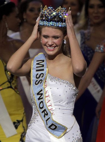 Miss USA Alexandria Mills, 18, holds her crown after wining the Miss World 2010 title in Sanya, on the Chinese island of Hainan