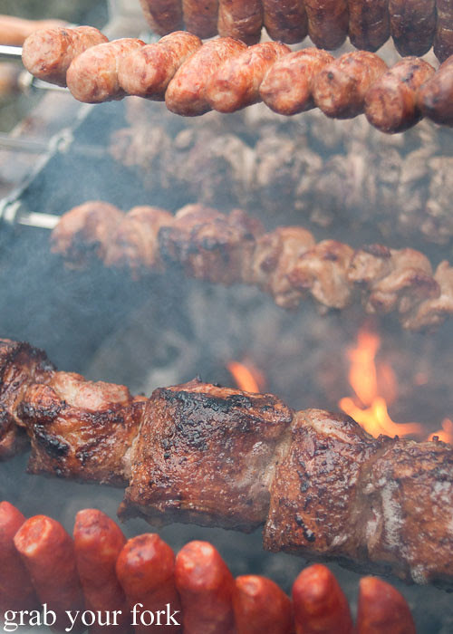 charcoal chicken lamb and chorizo at the grounds of alexandria markets